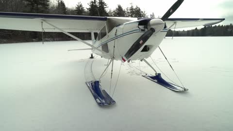 Cessna 180 ski flying Maine!