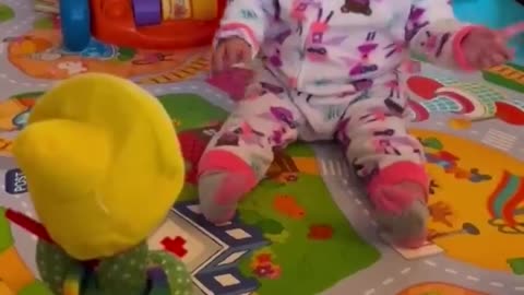 Babies play dancing cactus toy. Cutest baby funniest moment