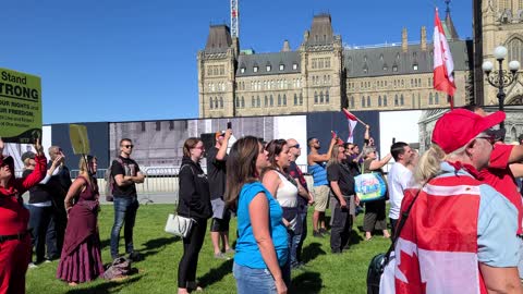 Canadians Sing 'Oh Canada' during Freedom Rally