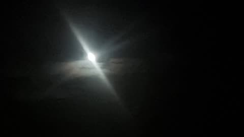 The Moon And Clouds Above Wales