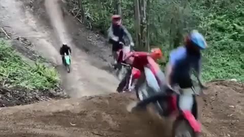 riding mini bikes on a mountain bike trail.