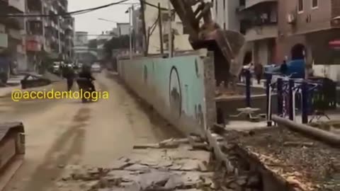 Wall Knocked Down On Biker