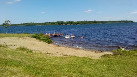 Swimming and testing out a inflatable boat at the point in Saint Regis Quebec in Akwesasne