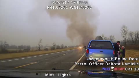 Officer Saves Woman and Her Elderly Mother From Burning Car