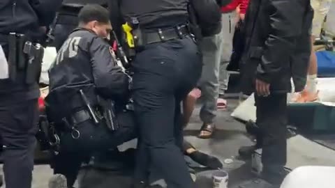 Illegal Migrants Attack NYPD Cops Making Arrest at NYC Migrant Shelter