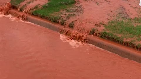 Busted Water Line Mixed with Red Clay