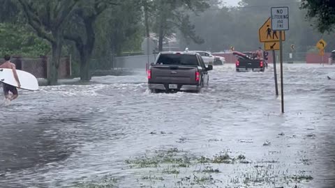 Surfing in the Street After Hurricane Ian