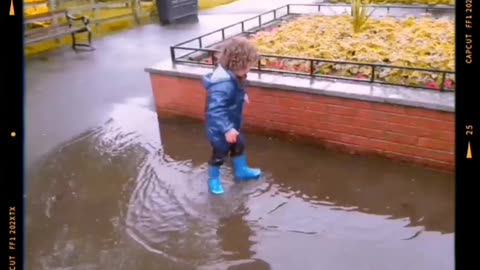 June 2015, Encouraging Ayrton & Gabrielle to jump from wall into big puddle