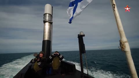 Norwegian P-3 Orion dropping a sonar buoy close to a Russian nuclear missile submarine