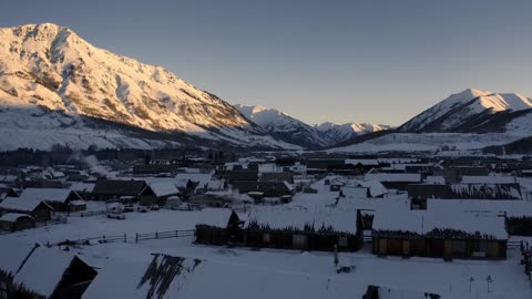 Outdoor aerial photography, the American countryside evening sunset snow scene