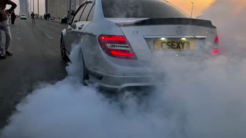 c63 burn out in public road