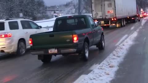 Truck Goes Nowhere Fast on Icy Roads