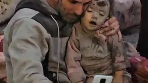 A bereaved Palestinian father captures a final moment with his young daughter