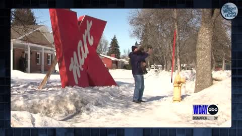 K-Mart sign in North Dakota Pastor's yard.