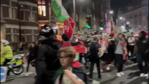 Scenes of jubilation from the Hamas victory parade through London last night