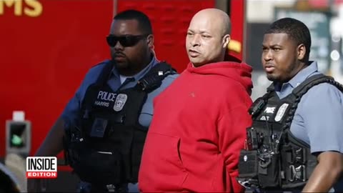 THE PERSON ARRESTED BY POLICE DURING THE PARADE IN KANSAS CITY WAS NOT THE GUNMAN