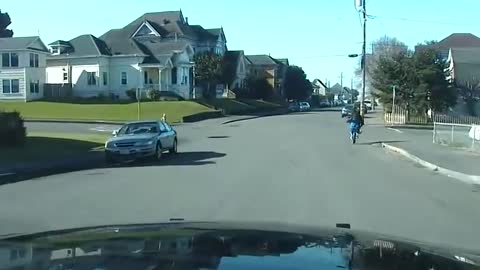 Bicycle Rider Tries To Shake Police Car!!!