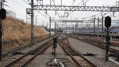 Kashiwadai Station with trains