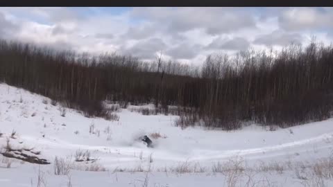 Snowmobiler Full Sends It Over Hill