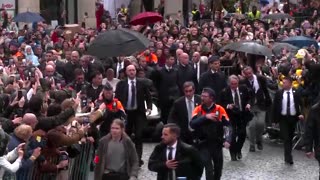 Thousands brave the rain to see Pope Francis in Belgium's Leuven