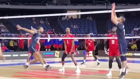 Boys playing shooting valley ball