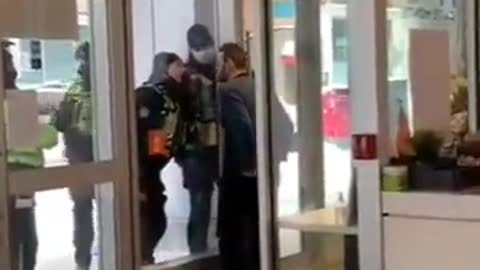 Ottawa. Police surrounding the iconic cafe in Ottawa today, threatening to break in