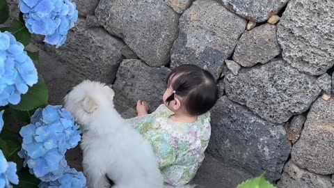 What? a baby with cute lil puppy, this is cute