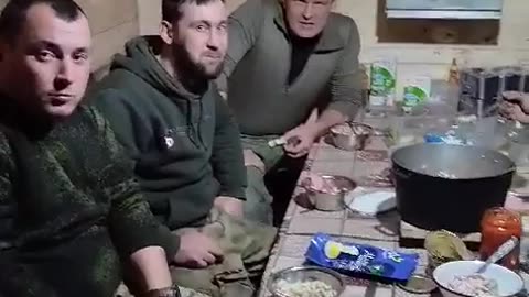 RU POV: 26-11-2023: Tankers of the 36th motorized rifle brigade. Footage of a field dinner.