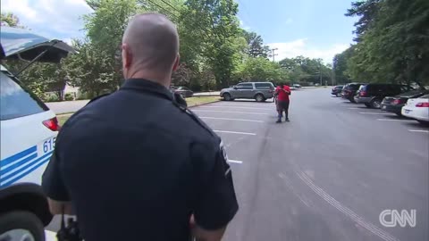 Photo of police officer consoling teen goes viral