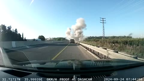 Dashcam footage shows a rocket impact this morning on a highway east of