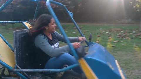 Laura Playing with Car.