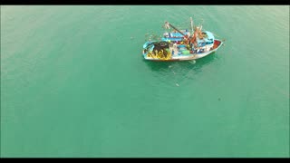 Shrimp Boat Offloading to a Smaller Boat, Crucita, Ecuador