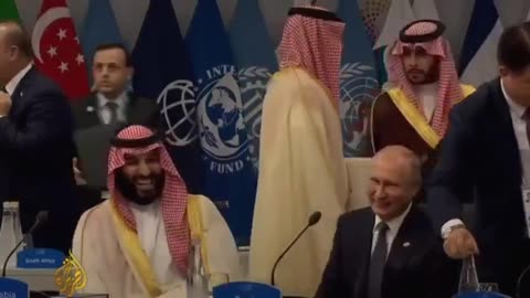 Putin and Saudi prince share a high five at G20 summit