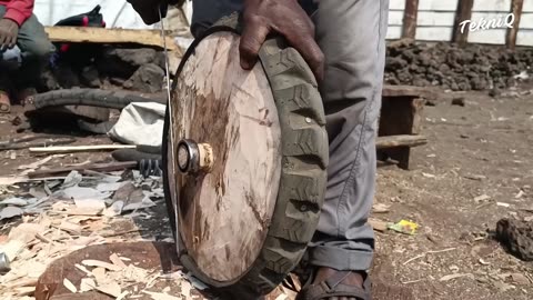 Riding Handmade Scooters in Congo