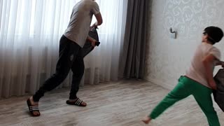 Blindfolded Pillow Fight Between Brothers