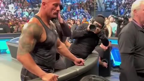 The Rock greets some Make-a-Wish families after laying the SmackDown on Austin Theory