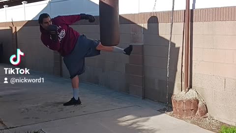 Old School Leather Punching Bag Workout Part 10. Practicing High Kicks!