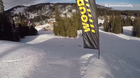 Orange pants green jacket ski jump fail lands on back