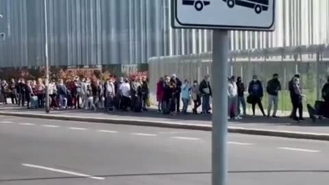 Food Shortages: Thousands of citizens lined up silently to collect a food package in Milan