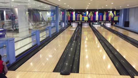 Adorable child Done Clever shot At Bowling!