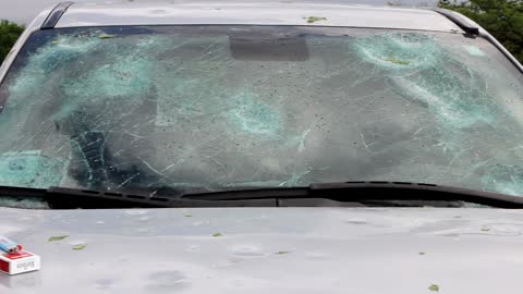 Woman Runs Outside During Hailstorm