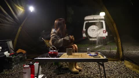 Enjoying a peaceful solo shelter while camping and in a rain tent during a tropical storm