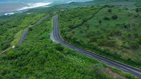 Curv road on a tree covered hills