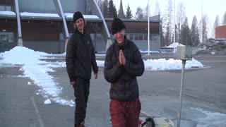 Snowboarder Turns Roof into Rail