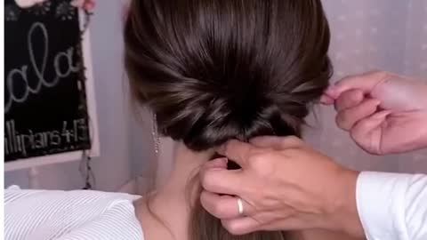 Here's one unique way of doing an elegant low bun!