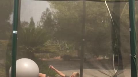 Kid trampoline yoga ball landing fail