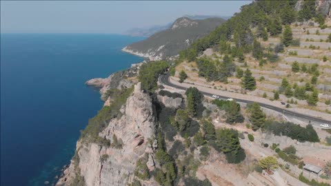 aerial view of beautiful rocky island of mallorca drone footage of mountain island