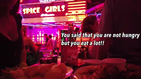 I bought fried chicken and shrimp for the bar girls in Soi Cowboy in Bangkok, Thailand