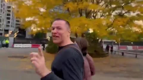 A furious woman in Brooklyn confronted a couple tearing down photos of civilians