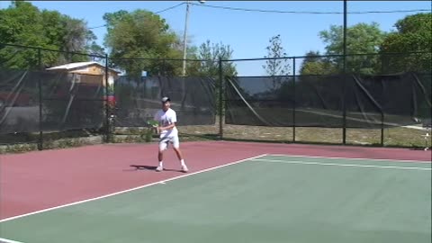 Ethan playing tennis